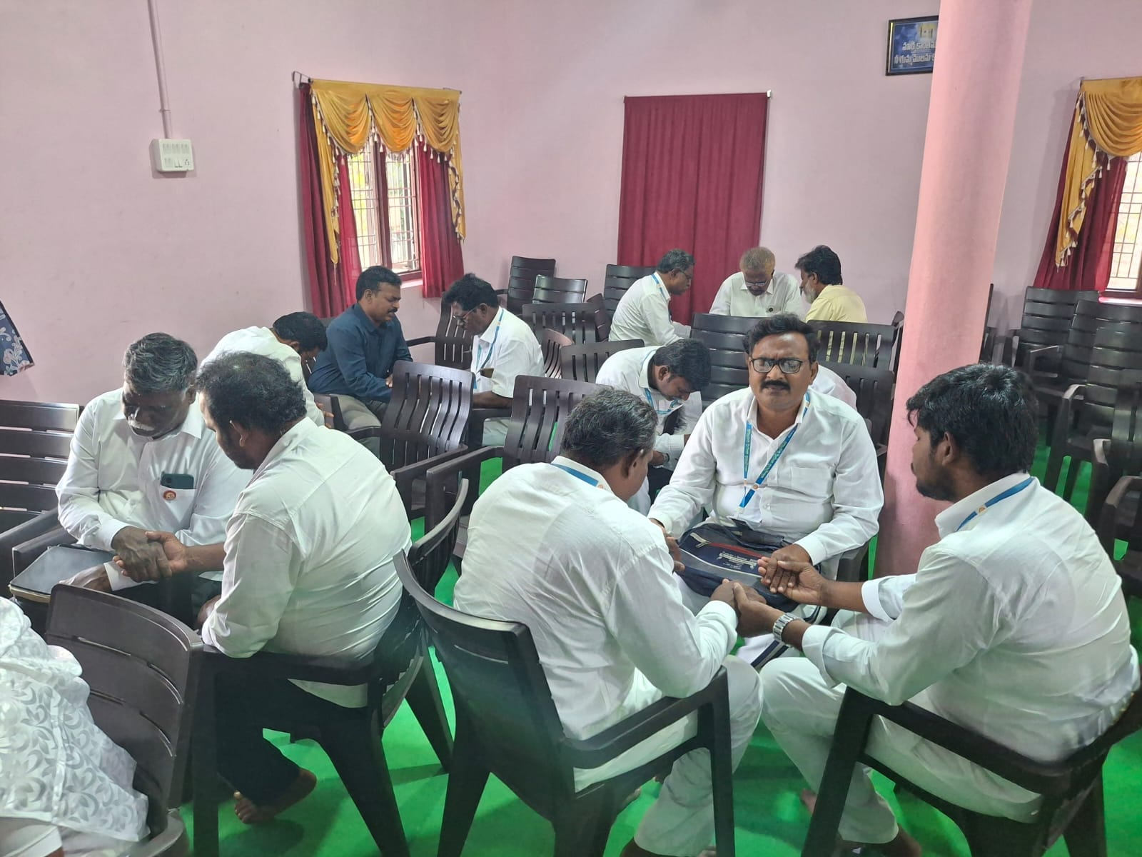 Pastors praying together in fellowship