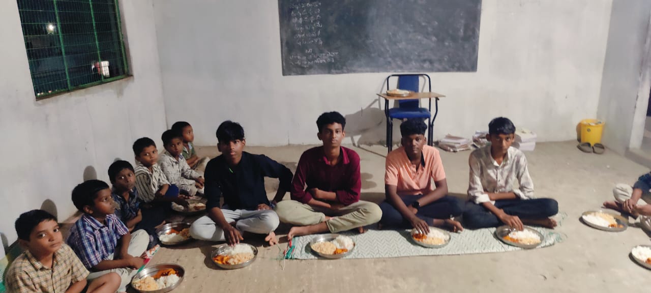 Plates served in the hall — Food for the Needy