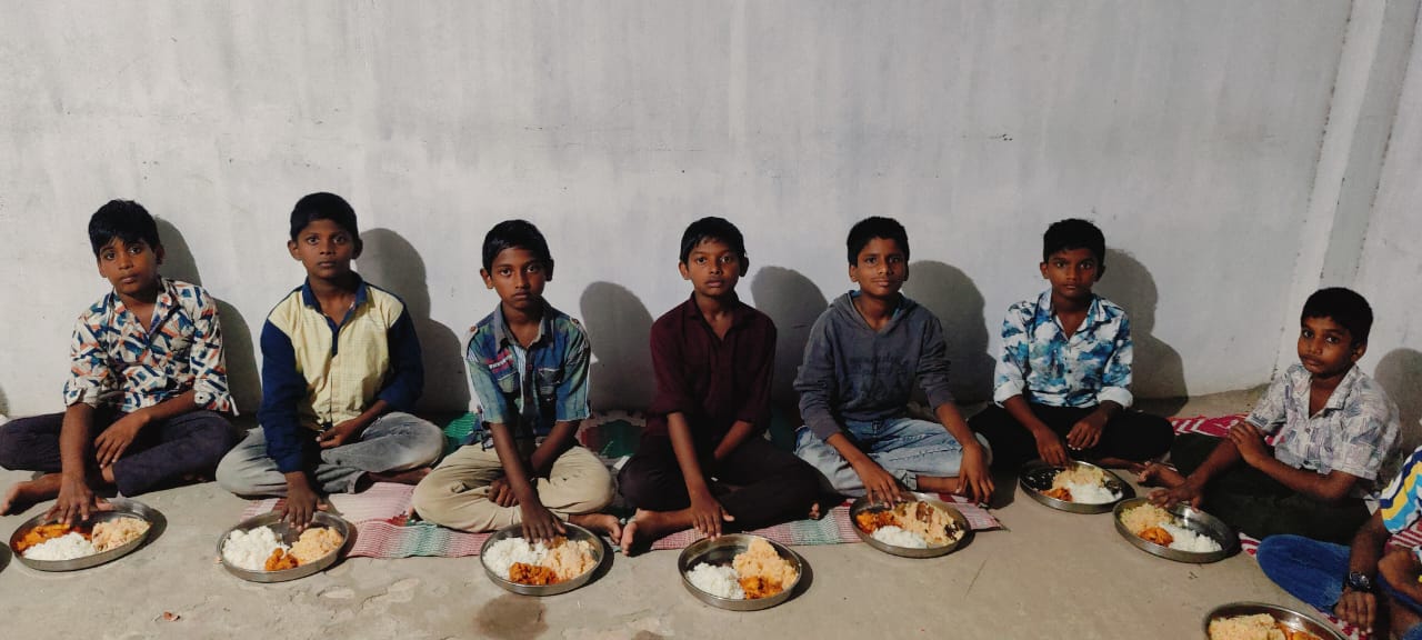 A row of hungry hearts fed — Food for the Needy