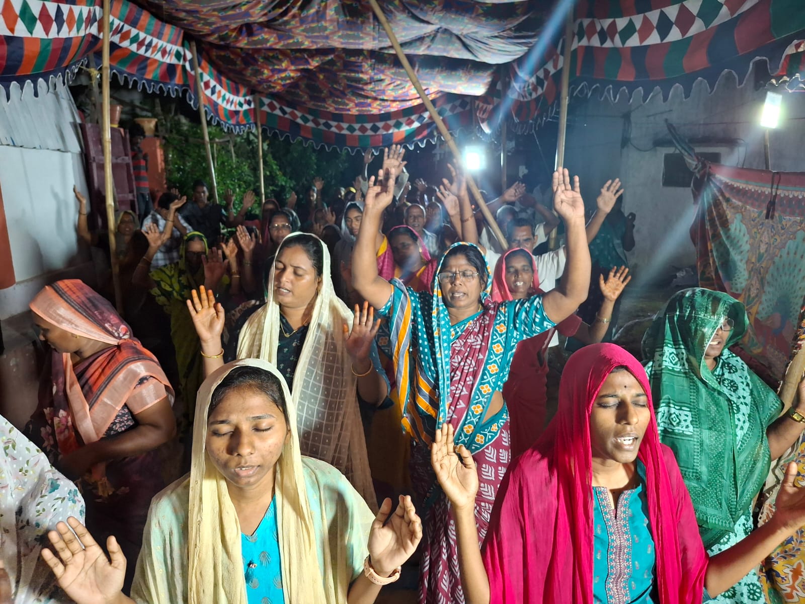Hands lifted in worship — Open Air Meetings
